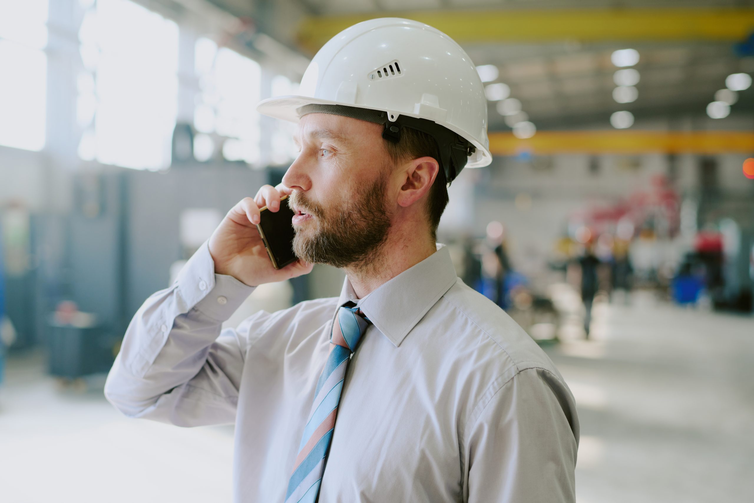 surveyor on phone call