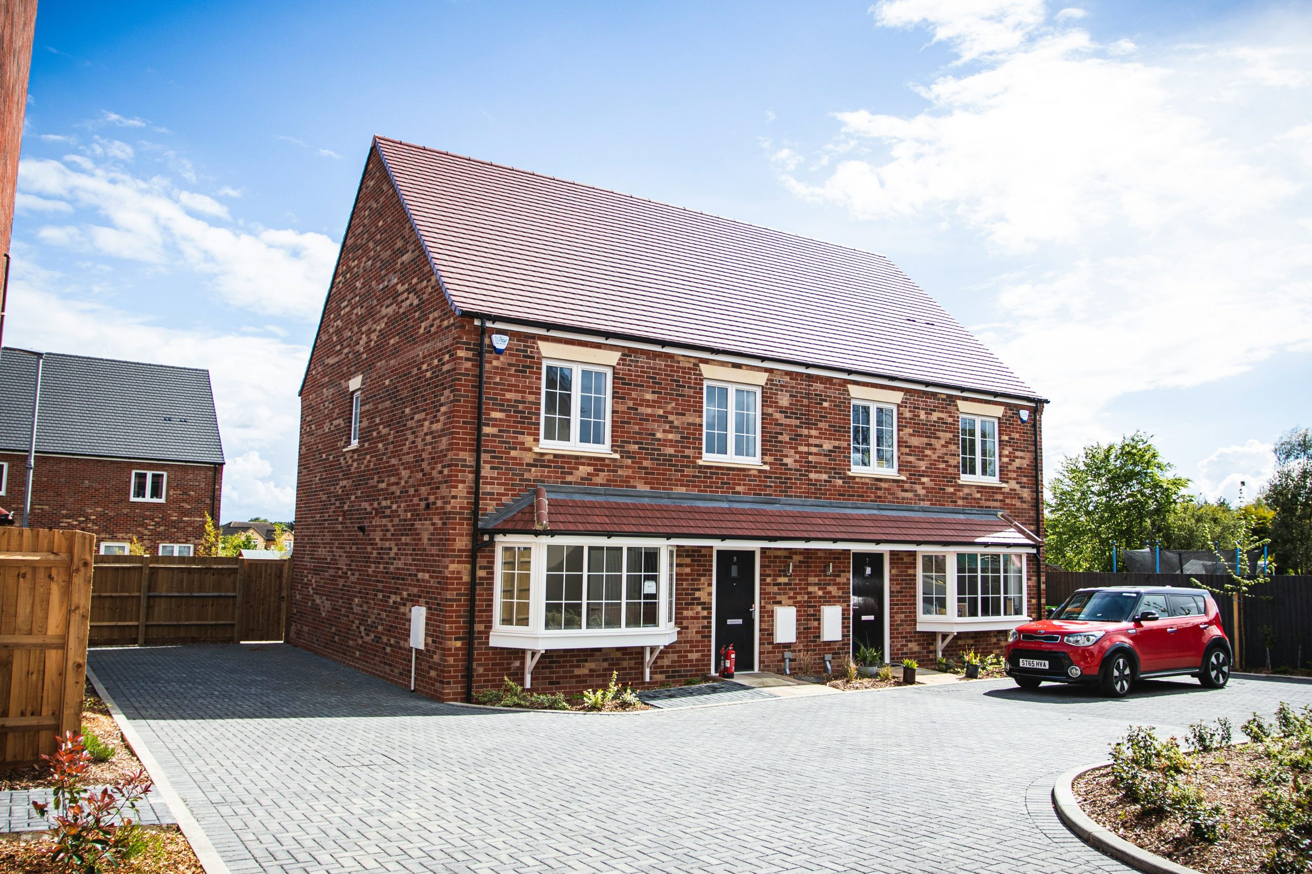 semi-detached red brick new build houses