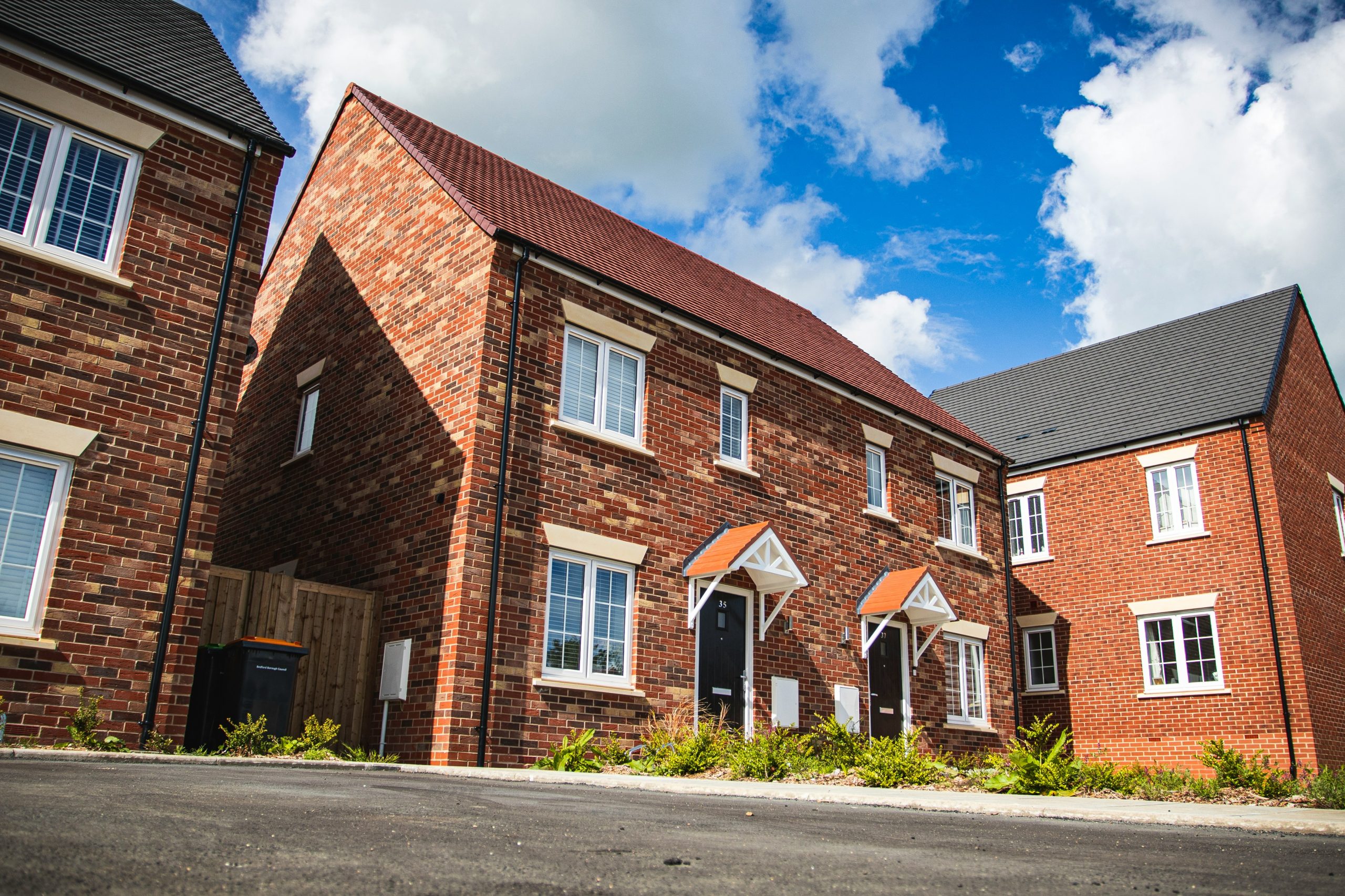 semi-detached red brick new build houses